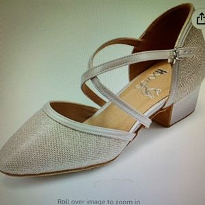 Formal shoes in champagne rose gold. Worn once,are very comfortable. 1-1/2”heel.